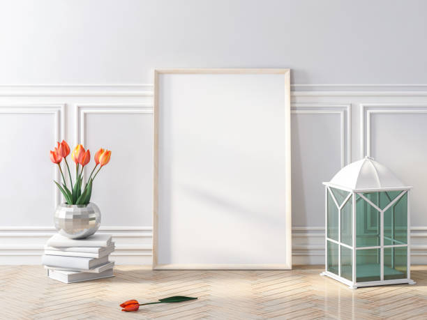 istock Frame poster, empty picture on wooden floor with flowers 1061427406