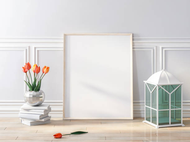 istock Frame poster, empty picture on wooden floor with flowers 1061427408