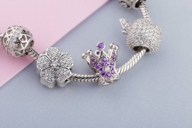 istock Bracelet with silver charm beads with gems 1061431266