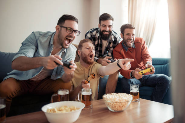 istock Friendship, technology, games and home concept 1061432332