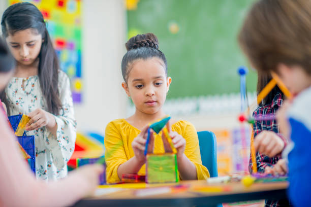 istock Girl Playing With Toys 1061432412