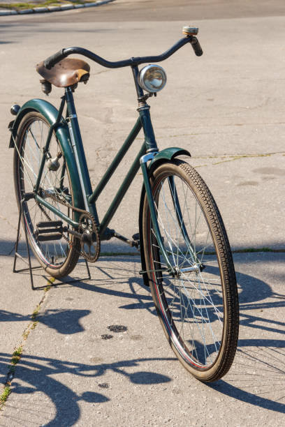 istock Retro bicycle parked on city street 1061437174