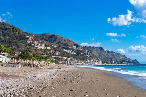 Photo of Letojanni. Nestled to the north of Taormina, Letojanni is a popular coastal resort. Sicily, Italy.