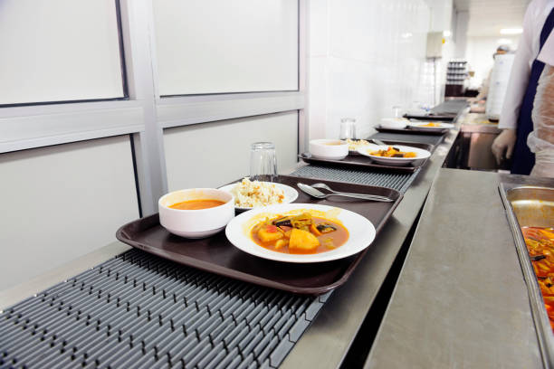 Food service in a commercial kitchen on the conveyor belt