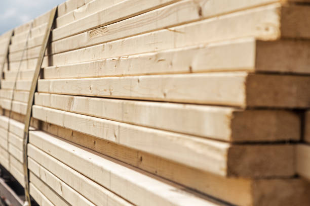 A load of delivered lumber on a trailer for a building project.