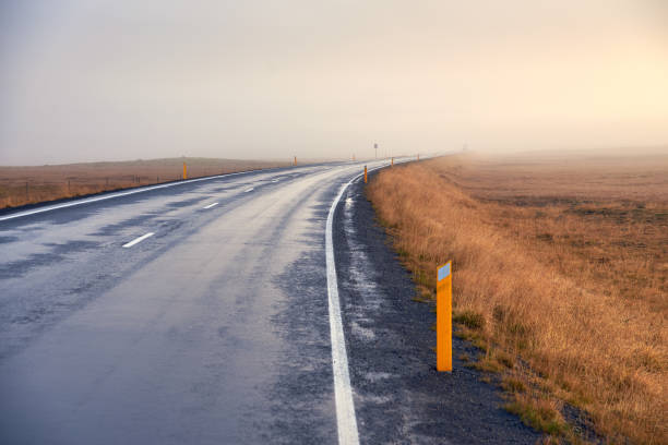 istock Foggy road in Iceland 1061444434