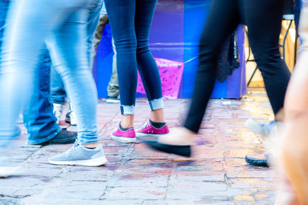Abstract blurred image of people walking on the street