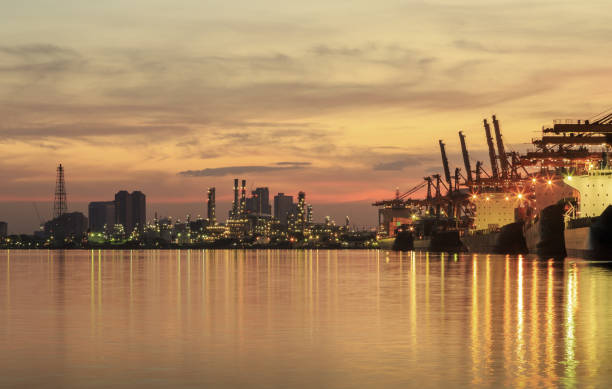 istock Pier port with container Cargo freight ship working crane in shipyard 1061446650
