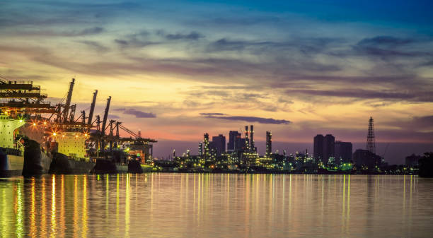 istock Pier port with container Cargo freight ship working crane in shipyard 1061446658