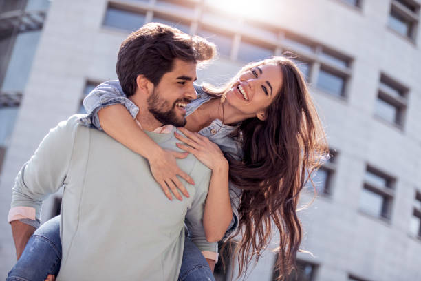 istock Happy romantic people on street 1061447452