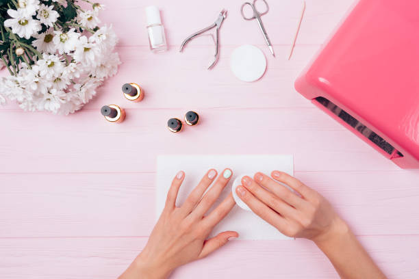 istock Flat lay arrangement woman making shellac manicure 1061447806