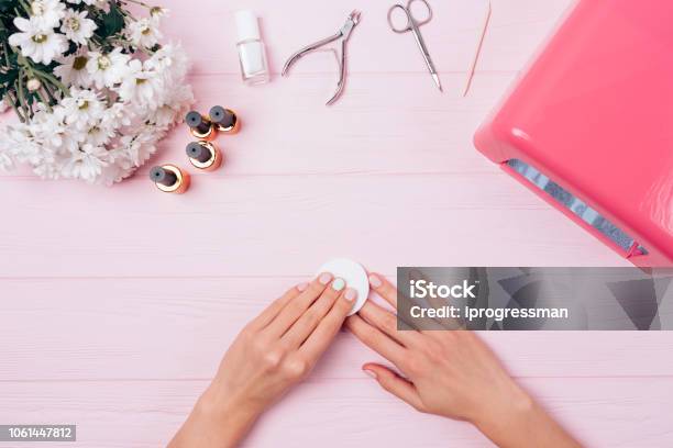 Top View Floral Composition Female Hands Remove Sticky Layer Stock Photo - Download Image Now