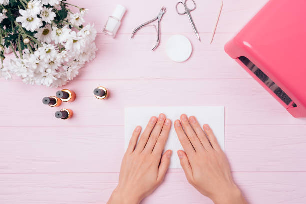 istock Young woman's hands near UV lamp 1061447848