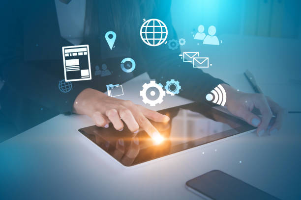 istock Woman works with tablet in office, internet icons 1061453140
