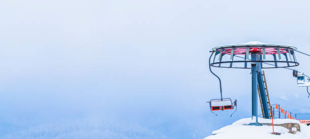 Ski-lift in the mountains at ski resort.