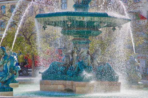 istock Famous Rossio Square fountain in Lisbon 1061454750