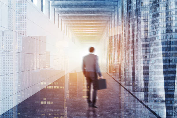 istock Long corridor with light in the end, businessman 1061456598
