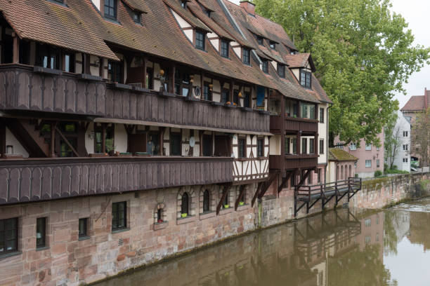 Scenic summer view of the German traditional medieval half-timbered Old Town architecture in Nuremberg, Germany Scenic summer view of the German traditional medieval half-timbered Old Town architecture in Nuremberg, Germany fuerth stock pictures, royalty-free photos & images