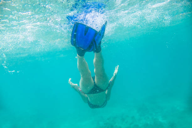 istock Hawaiian female snorkeling 1061461142