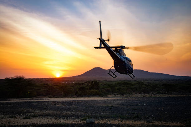Dawn Flight Dawn Flight in Kenya, Samburu National Park helicopter photos stock pictures, royalty-free photos & images