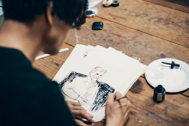 istock Mature male artist sketching ideas in his studio 1061468566