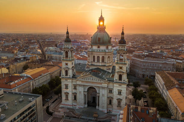 Budapest, Hungary - The rising sun shining through the tower of the beautiful St.Stephen's Basilica stock photo