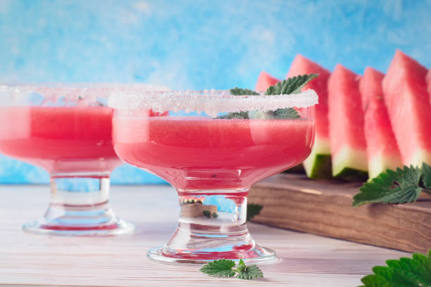 istock Drink smoothies from red watermelon in glass dishes 1061477060