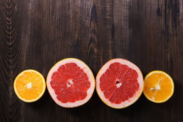 istock citrus background, grapefruit and orange slices 1061477178