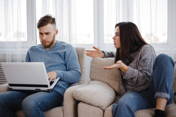 istock angry woman quarrel to man ignoring her 1061477264