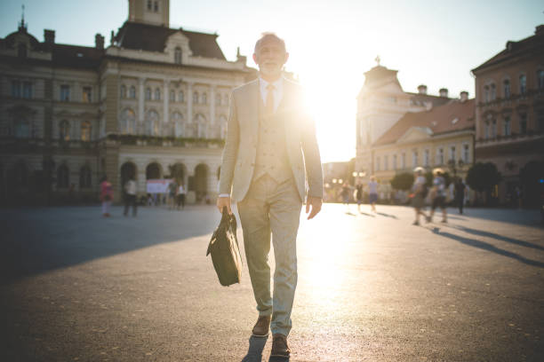 istock Confident senior man going to work on a sunny day 1061479284
