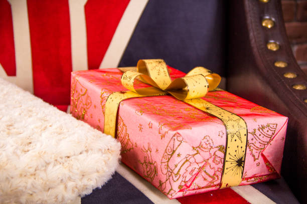 istock New Year's gift decorated with beautiful paper and bow 1061492080