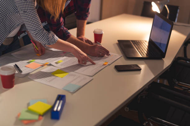 istock Business colleagues working overtime in an office 1061493834