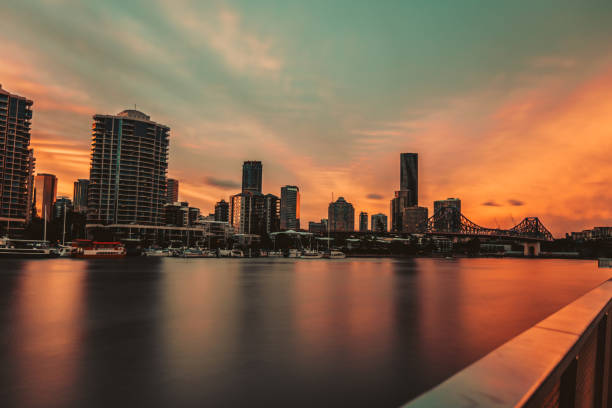 istock Sunrise sky over city and rive 1061497612