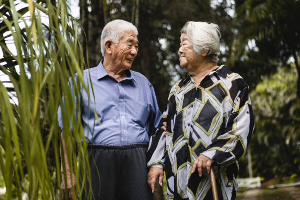 istock Japanese elderly couple in the garden 1061499184