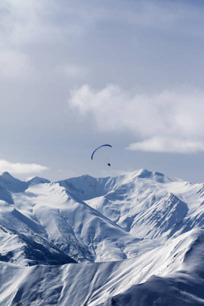 istock Sky gliding in winter mountains 1061501660