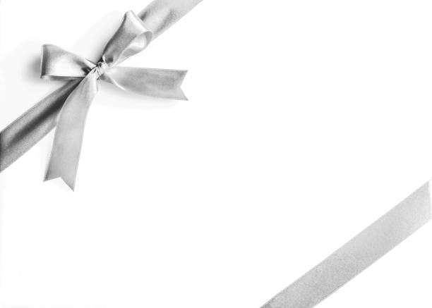 istock Silver white grey ribbon bow corner stripe fabric isolated on white background with clipping path 1061502124