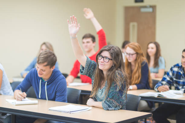 istock College students asking questions in the classroom 1061502310