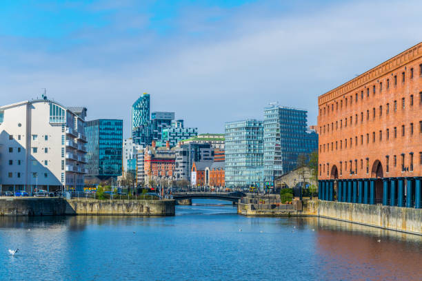 View of the business center of Liverpool through Queens dock, England View of the business center of Liverpool through Queens dock, England hull house stock pictures, royalty-free photos & images