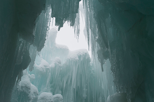 These icicles were part of a winter festival near Heber City, Utah.  These were manmade structures made by slowly dripping water into the freezing winter weather.  The spikes have a slightly blue hue to them.