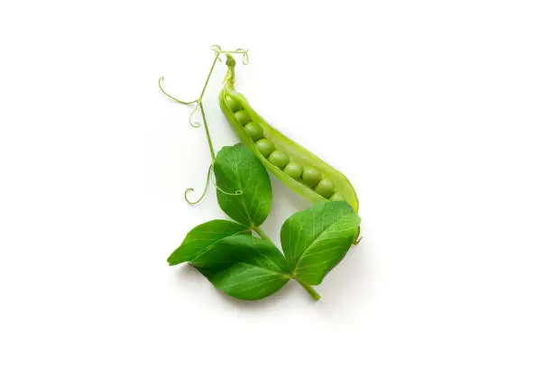 Isolated sweet green peas. Top view. White background.