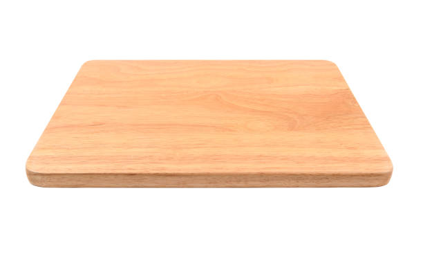 istock Brown wooden cutting board on white background. 1061530468