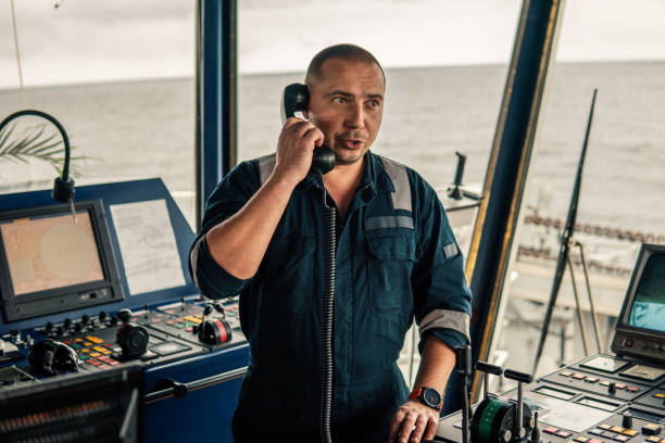 istock Marine navigational officer is reporting by VHF radio 1061549972