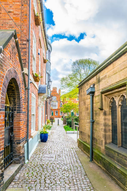 istock an alley passing cathedral in Leicester, England 1061561154