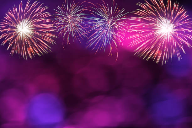 istock Colorful firework and blurred bokeh light with copy space in Christmas and New Year. Abstract background holiday concept. 1061567602
