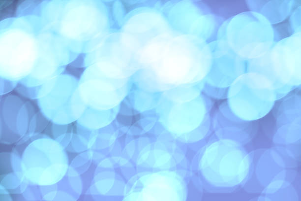istock Abstract blurred colorful bokeh lights background. Defocused glitter light. 1061572622