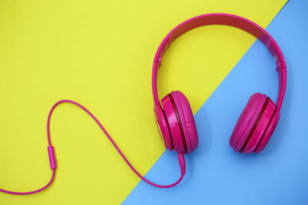 istock headphones on colorful background. 1061577338