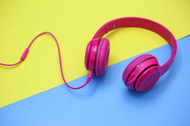 istock headphones on colorful background. 1061577364