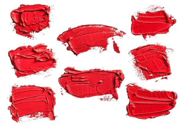 Photo of Set of eight textured red oil paint brush stroke, convex with shadows, isolated on white background. Each item can be downloaded separately in high resolution in my portfolio.