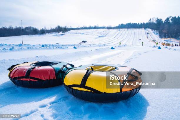 Snow Tubing Sleigh On The Top Of The Hill Winter Activity Stock Photo - Download Image Now