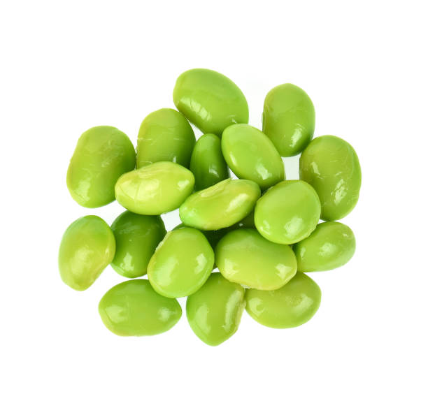 istock Top view of Green soybeans on white background 1061586620
